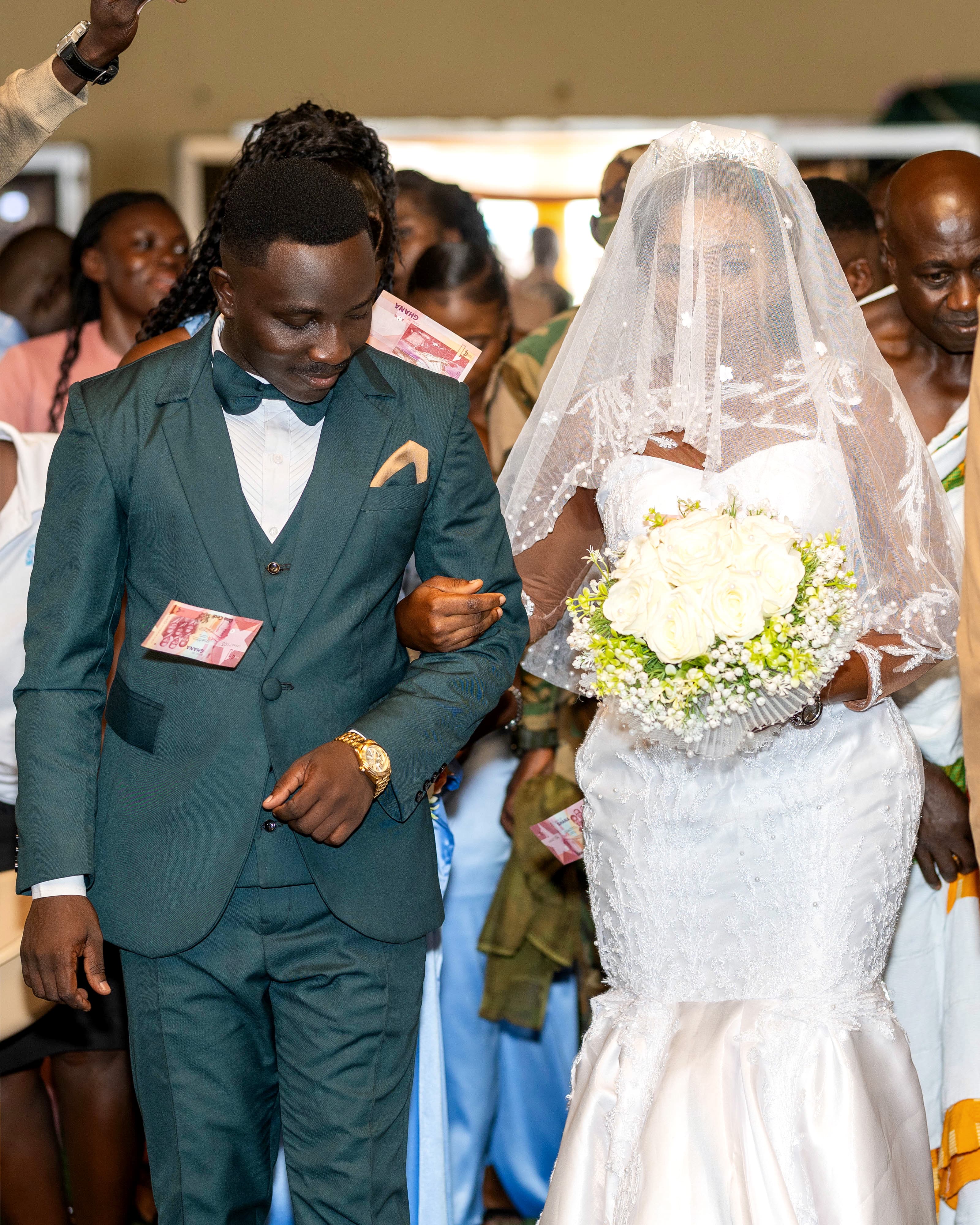 Street photo of a man walking through a narrow alley